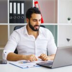 cheerful young handsome modern director working on 2023 03 07 03 28 30 utc qdb7recxwvsp7481dg2352rkq4jd1jbu8jpdt4rbao web designing company